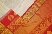 Handwoven Gadwal silk brocade saree in off white with floral motifs on the body