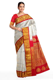 Handwoven Gadwal silk brocade saree in off white with floral motifs on the body