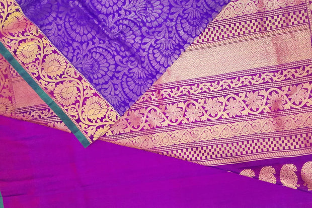 Handloom Gadwal silk brocade saree in violet  with floral motifs on the body