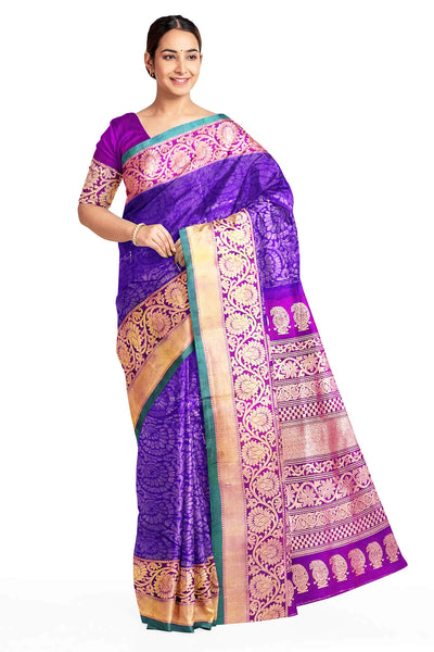 Handloom Gadwal silk brocade saree in violet  with floral motifs on the body