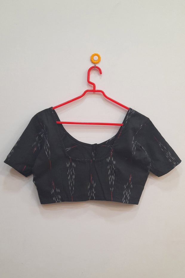 Ikat cotton blouse in black in floral pattern