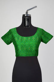 Handwoven Ikkat pure silk  fabric in dupioni finish in green