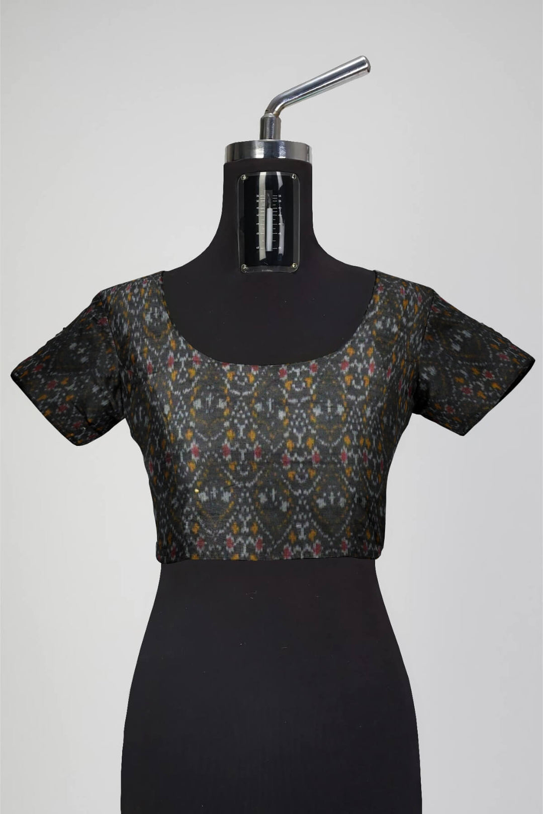 Handwoven Ikkat pure silk  fabric in dupioni finish in black.