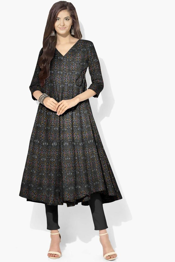 Handwoven Ikkat pure silk  fabric in dupioni finish in black.