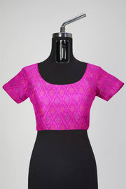 Handwoven Ikkat pure silk   fabric in dupioni finish in pink.