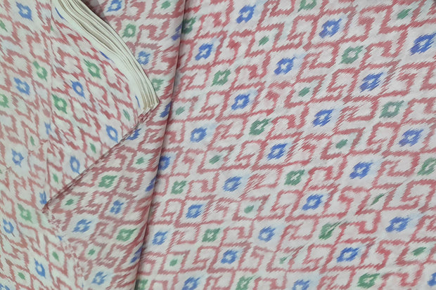 Handwoven Ikat pure silk fabric in diamond pattern in off white