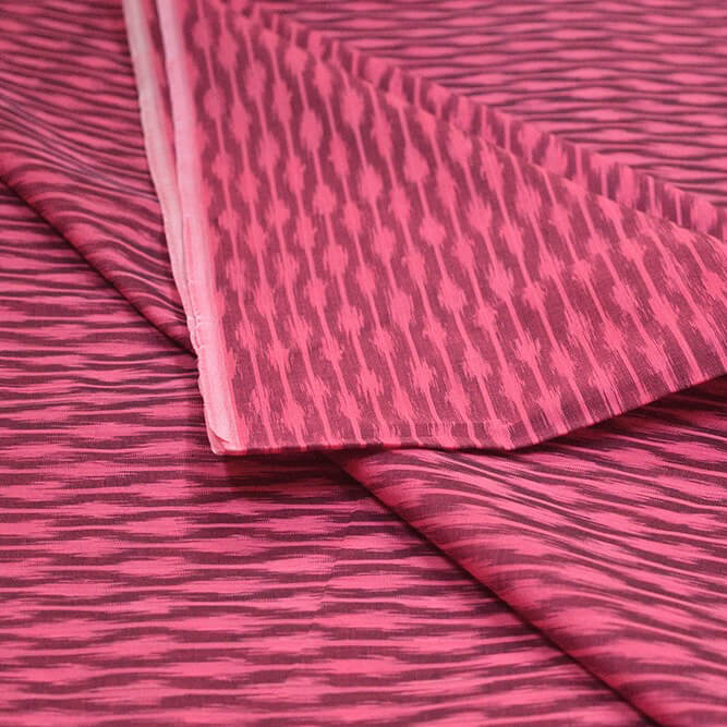 Handwoven ikat  pure cotton fabric in rust colour
