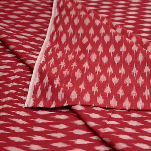 Handwoven ikat  pure cotton fabric in maroon