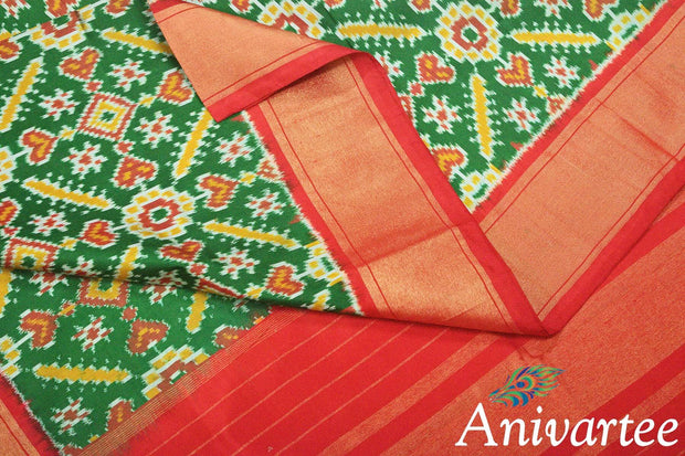 Handwoven Ikkat pure silk dupatta in green in pan patola pattern