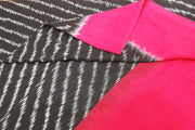 Handloom ikat   pure cotton  dupatta in black with diagonal lines and red borders.