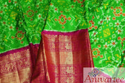 Handwoven Ikat pure silk unstitched lehenga material  in green in navaratan pattern