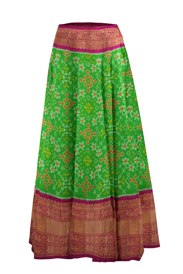 Handwoven Ikat pure silk unstitched lehenga material  in green in navaratan pattern