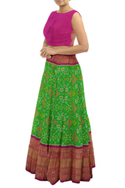 Handwoven Ikat pure silk unstitched lehenga material  in green in navaratan pattern