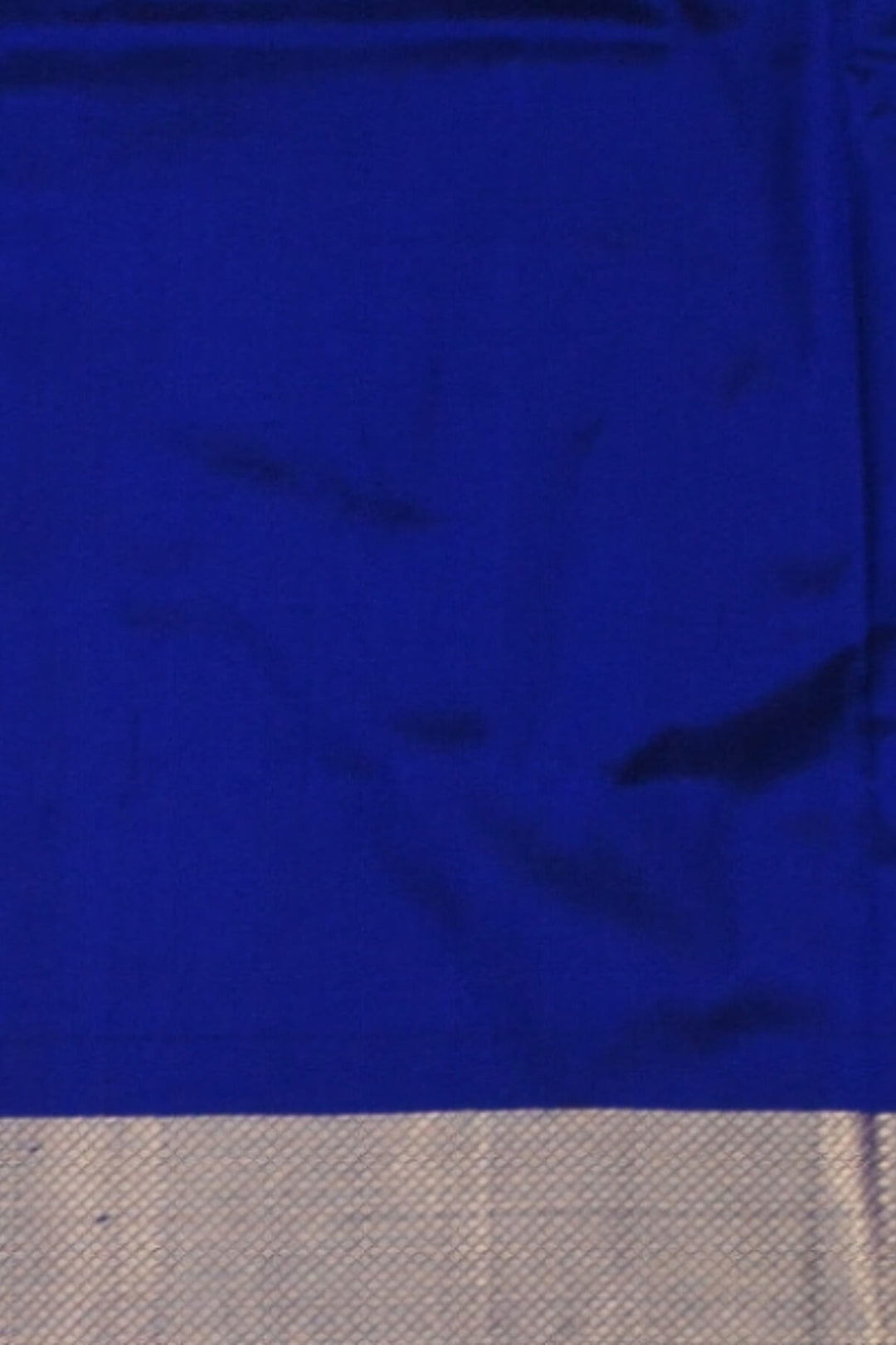 Handwoven Ikat  pure silk unstitched lehenga material in ananda blue  in floral pattern