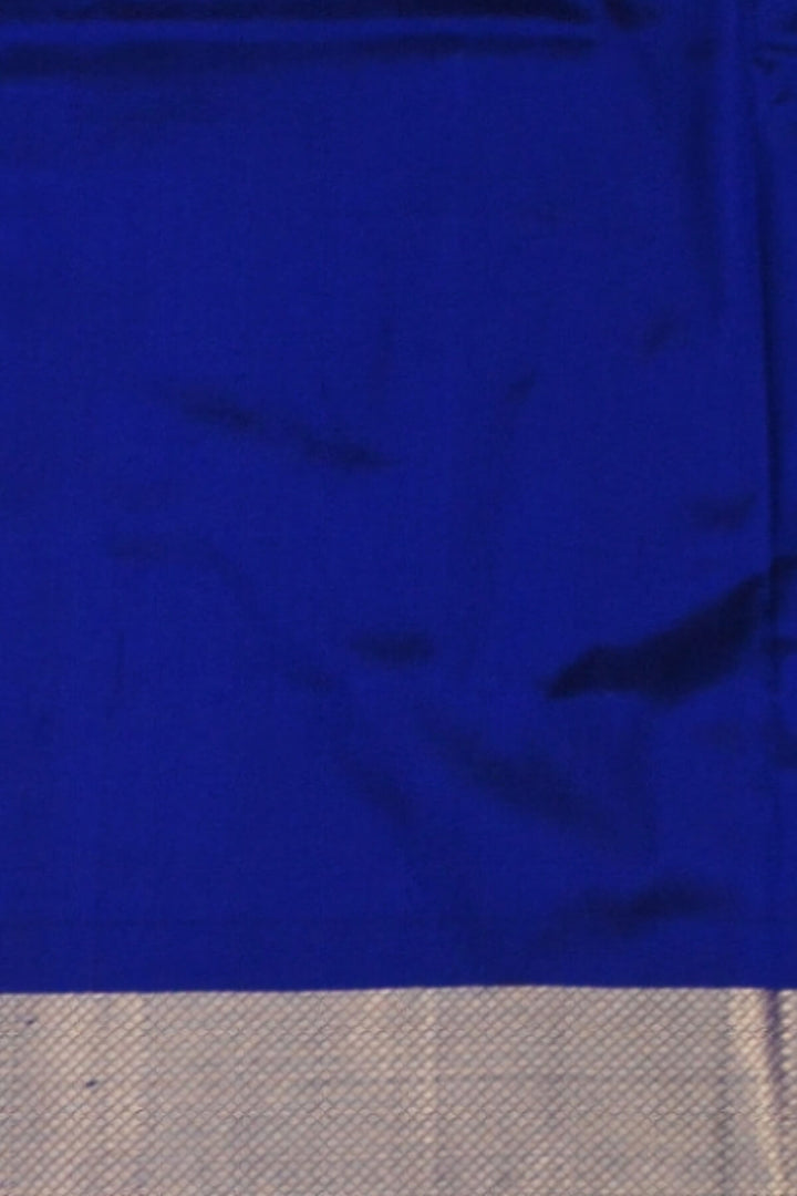 Handwoven Ikat  pure silk unstitched lehenga material in ananda blue  in floral pattern