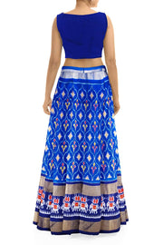 Handwoven Ikat  pure silk unstitched lehenga material in ananda blue  in floral pattern