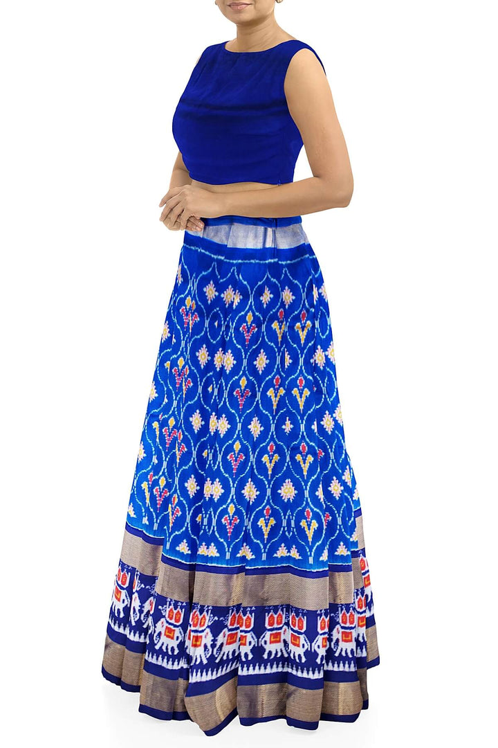 Handwoven Ikat  pure silk unstitched lehenga material in ananda blue  in floral pattern