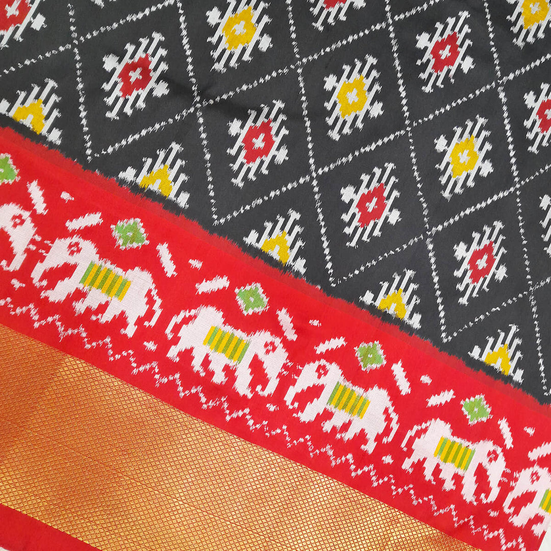 Handwoven Ikat pure silk unstitched lehenga material in black  in diamond pattern