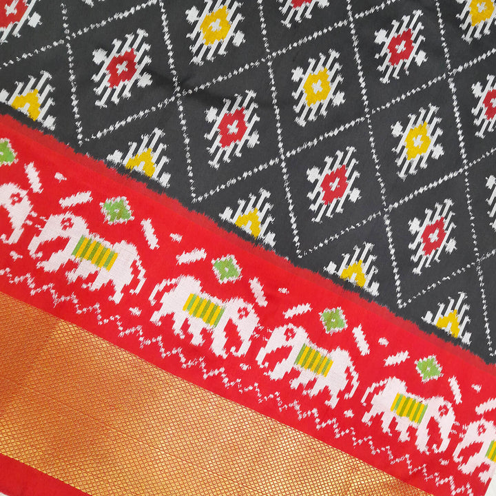 Handwoven Ikat pure silk unstitched lehenga material in black  in diamond pattern