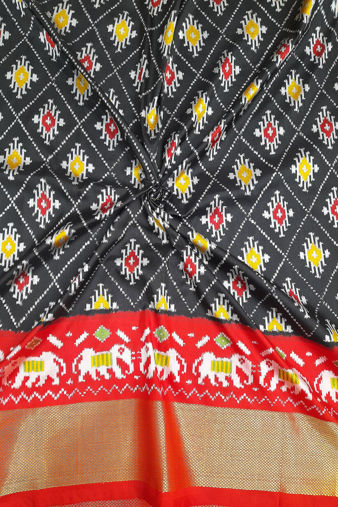 Handwoven Ikat pure silk unstitched lehenga material in black  in diamond pattern