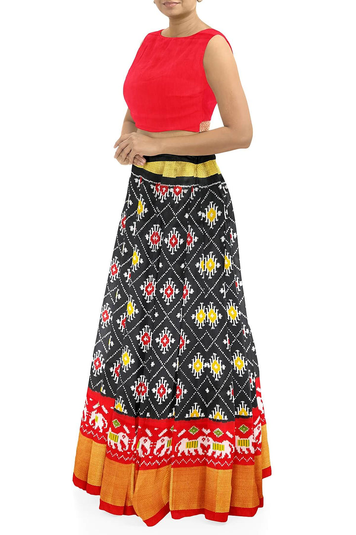Handwoven Ikat pure silk unstitched lehenga material in black  in diamond pattern