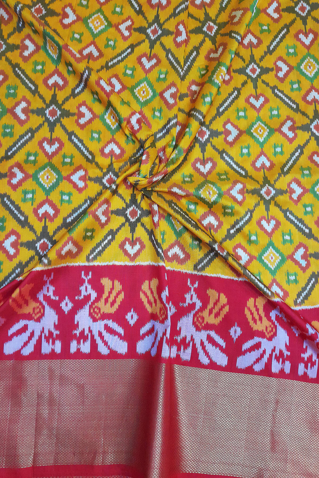 Handwoven Ikat pure silk unstitched lehenga material in mustard  in pan bhat pattern
