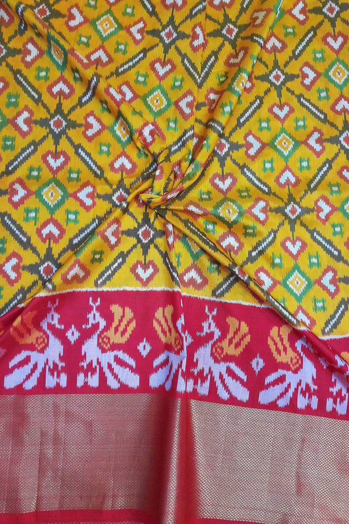 Handwoven Ikat pure silk unstitched lehenga material in mustard  in pan bhat pattern