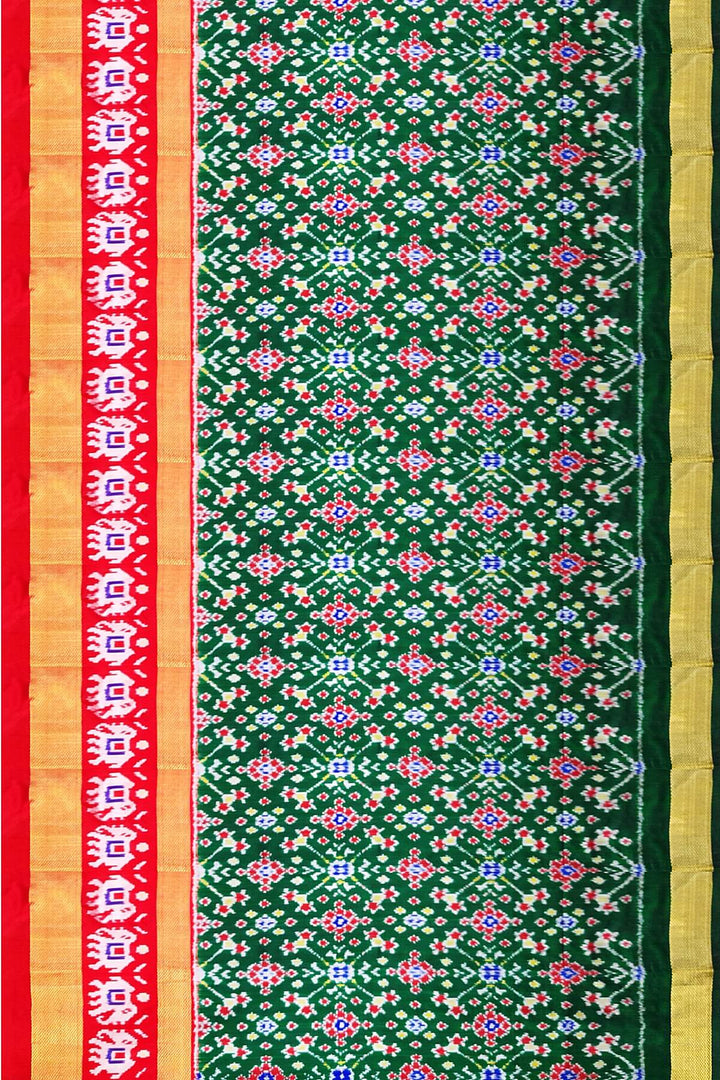 Handwoven Ikat pure silk unstitched lehenga material in bottle green  in navratan pattern