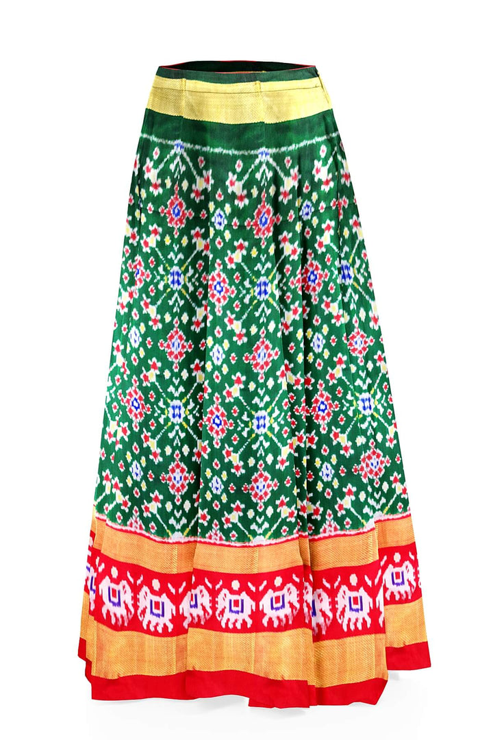 Handwoven Ikat pure silk unstitched lehenga material in bottle green  in navratan pattern