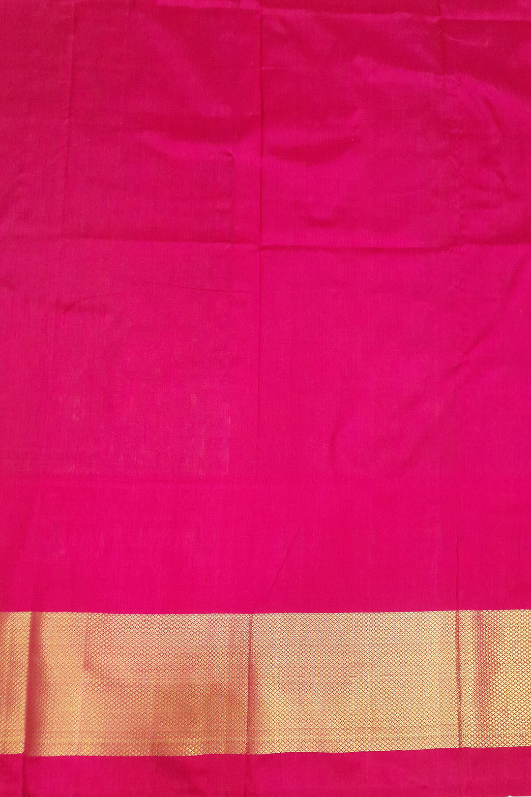 Handwoven Ikat pure silk unstitched lehenga material in orange  with plant motifs.