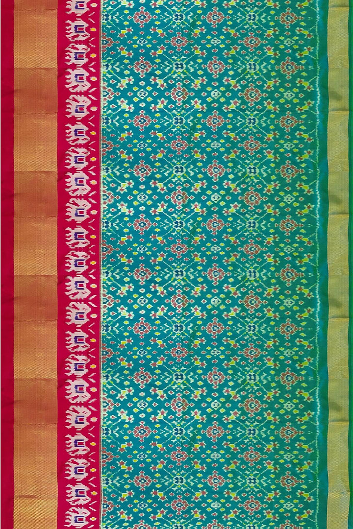Handwoven Ikat pure silk unstitched lehenga material in teal green & pink in navratan pattern