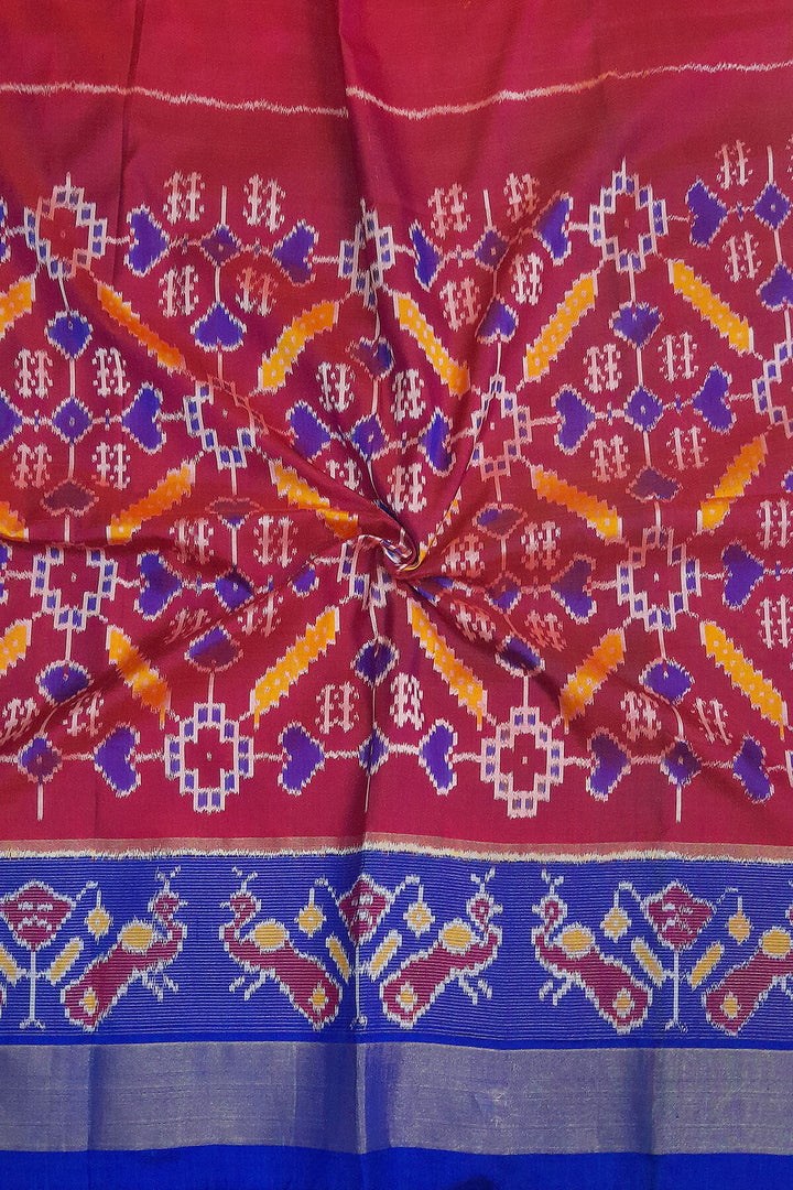 Handwoven Ikat pure silk unstitched lehenga material in  magenta in pan bhat pattern