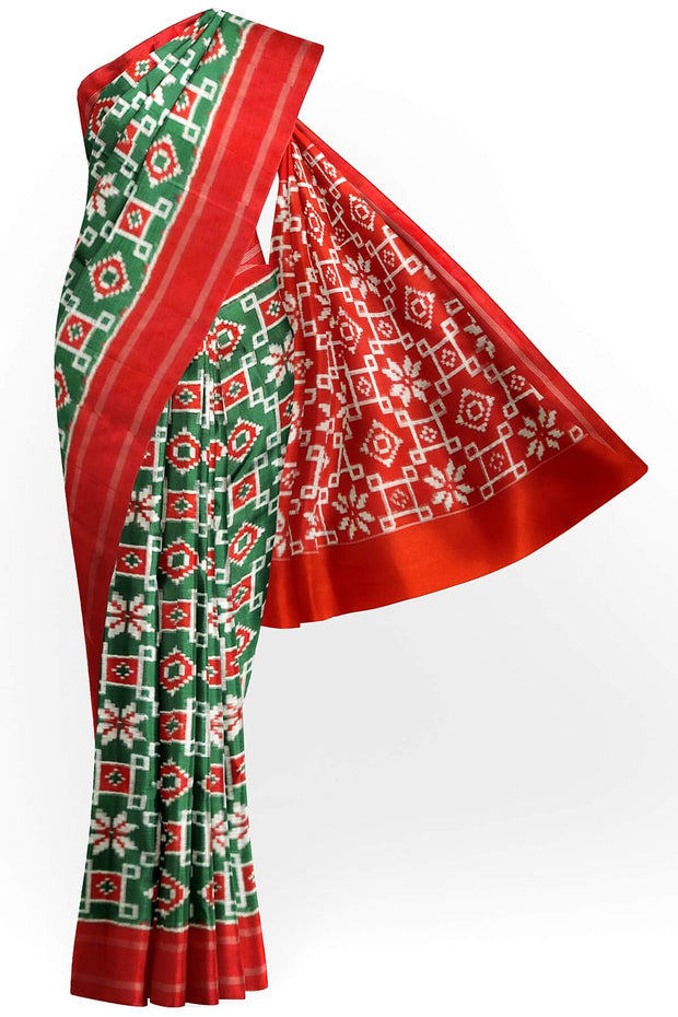 Double Ikat telia pure silk saree in green with floral motifs on the body