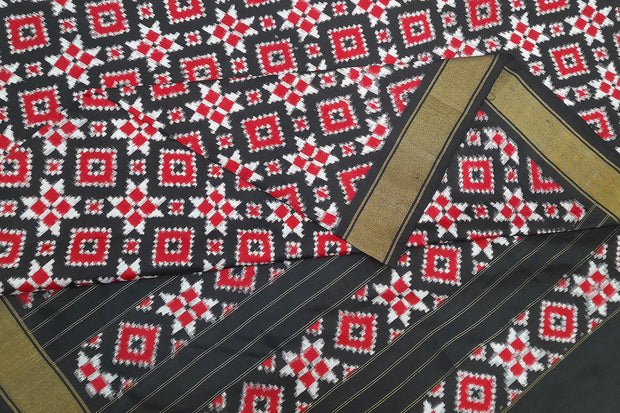 Double ikat telia pure silk saree in black, red & white in geometric pattern