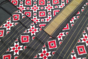 Double ikat telia pure silk saree in black, red & white in geometric pattern