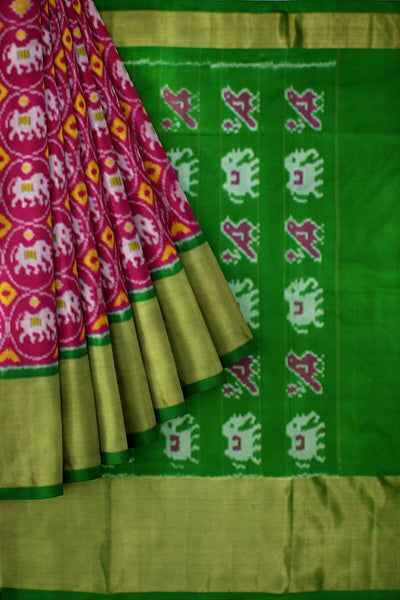 Handwoven Ikat pure silk saree in pink with elephant motifs and a big zari border