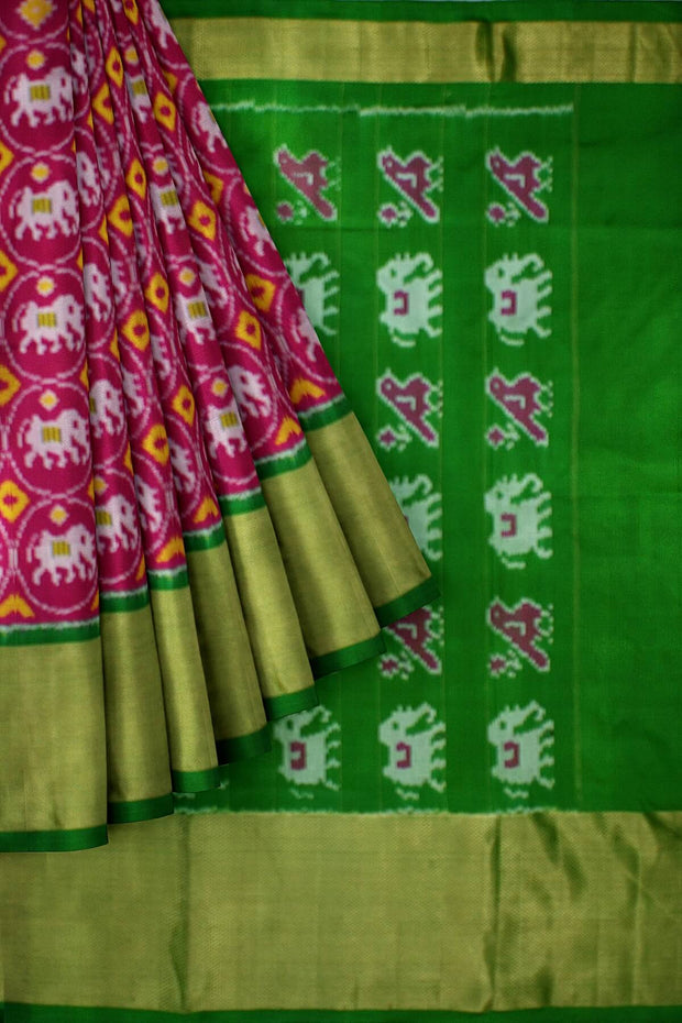 Handwoven Ikat pure silk saree in pink with elephant motifs and a big zari border