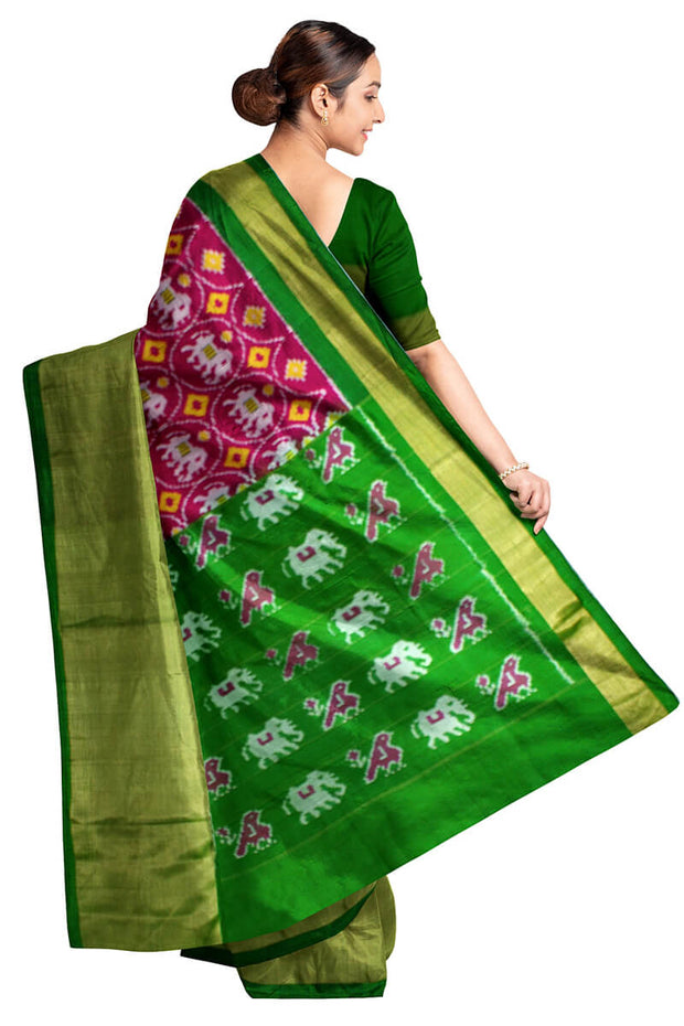 Handwoven Ikat pure silk saree in pink with elephant motifs and a big zari border