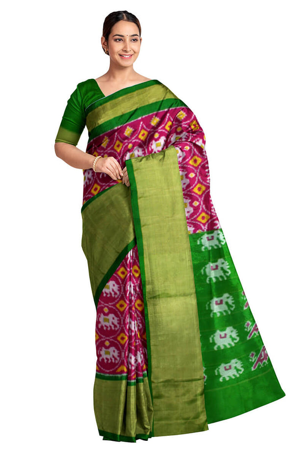 Handwoven Ikat pure silk saree in pink with elephant motifs and a big zari border