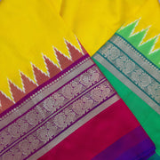 Handwoven Ikat pure silk saree in yellow with Ganga Jamuna  kanchi   border