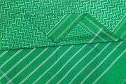 Ikat pure silk saree in wave pattern in green