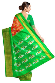 Ikat pure silk saree in orange in diamond pattern with elephant motifs in zari border & pallu.