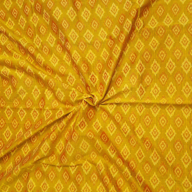 Handwoven  Ikat silk cotton fabric in yellow