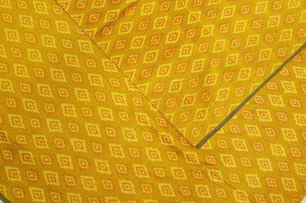Handwoven  Ikat silk cotton fabric in yellow