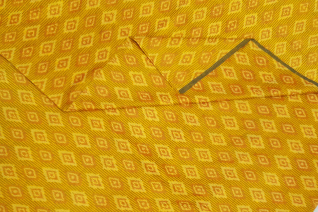 Handwoven  Ikat silk cotton fabric in yellow