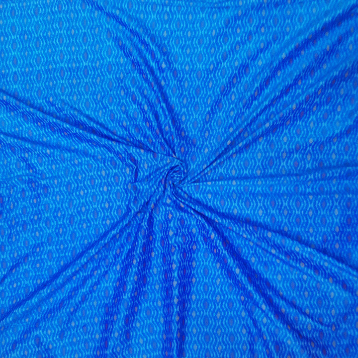 Handwoven  Ikat silk cotton fabric in medium torquoise