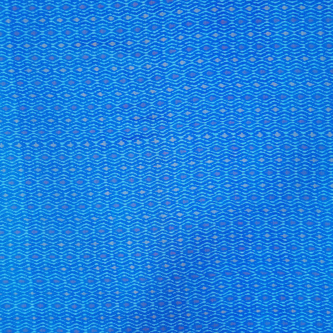 Handwoven  Ikat silk cotton fabric in medium torquoise