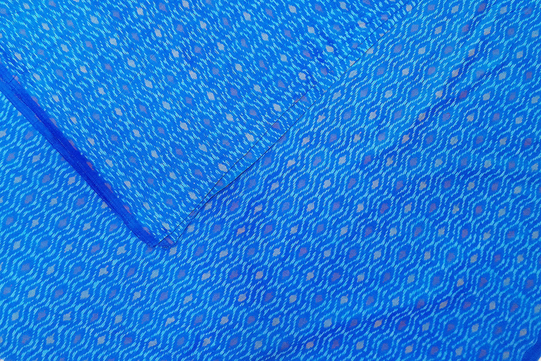 Handwoven  Ikat silk cotton fabric in medium torquoise