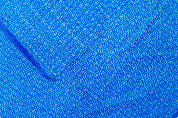 Handwoven  Ikat silk cotton fabric in medium torquoise