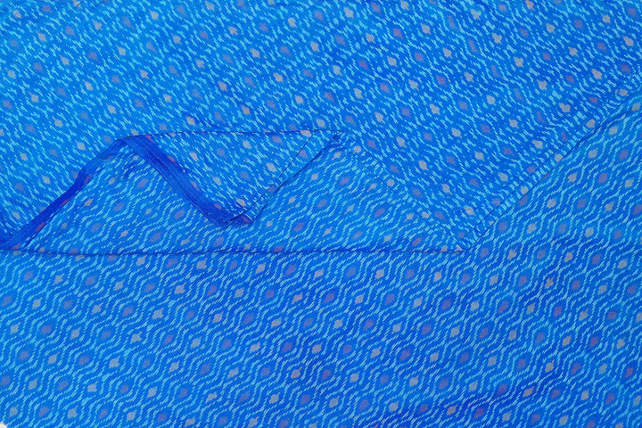Handwoven  Ikat silk cotton fabric in medium torquoise